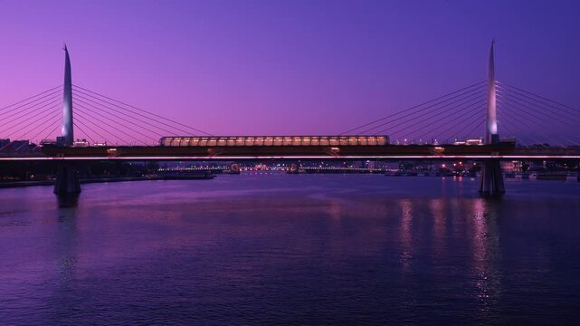 Night view of the Golden Horn Metro Bridge in Istanbul.