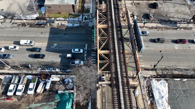 Cinematic 4K Drone Aerial Chicago Skyline Flying to Downtown Over CTA Green Line 'L' Train Tracks in Garfield Park