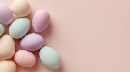 Pastel Easter eggs in blush, mint, lavender and cream tones arranged on smooth pink background, clean minimalist flatlay with negative space for editorial holiday greeting cards and spring celebration