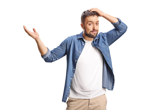 Forgetful young man with hand on his head