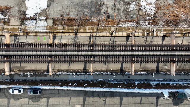 Cinematic 4K Drone Aerial Chicago West Side Flying Over CTA Green Line 'L' Train Tracks in Garfield Park