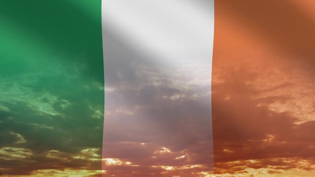 Flag of Ireland waving against a vibrant sunset, creating a patriotic and inspiring atmosphere with warm tones.