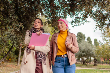 Naklejka premium Women wearing pink advocating breast cancer awareness