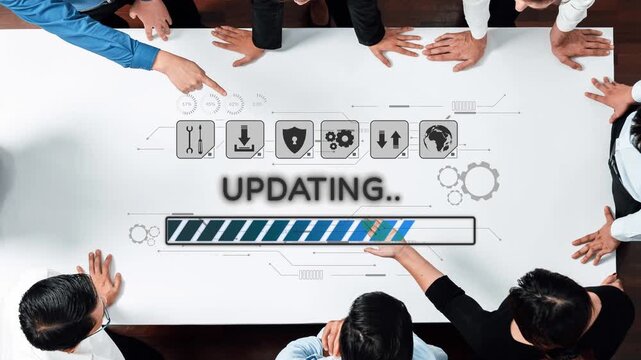 A diverse team engages in a collaborative business meeting, focused on updating technology. The workspace features a progress bar, symbolizing innovation and teamwork. Raster