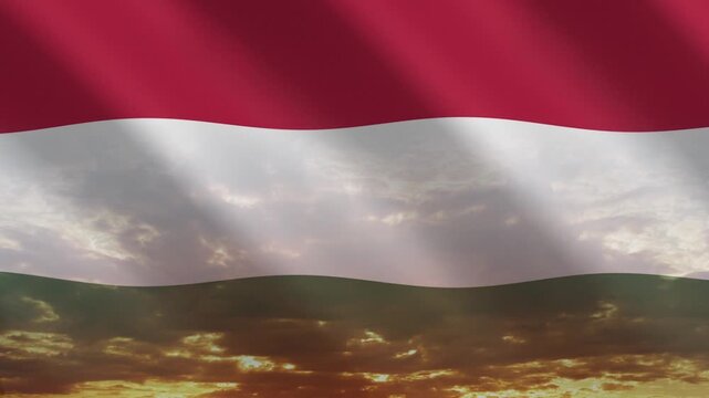 Flag of Hungary waving against a vibrant sunset, creating a patriotic and inspiring atmosphere with warm tones.
