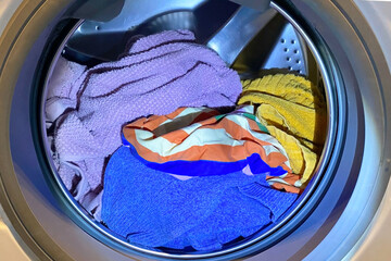 Colorful Laundry Inside a Washing Machine Drum