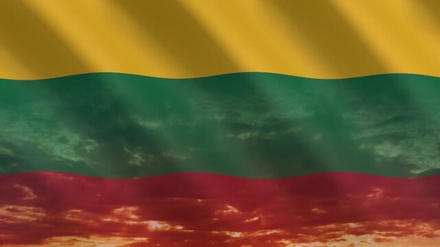 Flag of Lithuania waving against a vibrant sunset, creating a patriotic and inspiring atmosphere with warm tones.