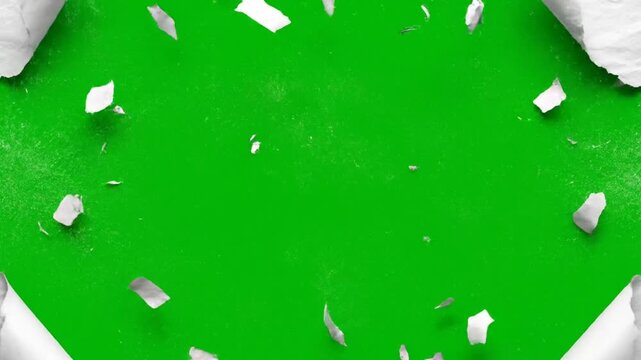 Green Screen Paper Tear Reveal Background With Falling White Pieces And Clean Transition Motion