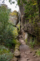 Fototapeta premium Bear Gulch Trail Squeezes Through Tight Rock Sections In Pinnacles