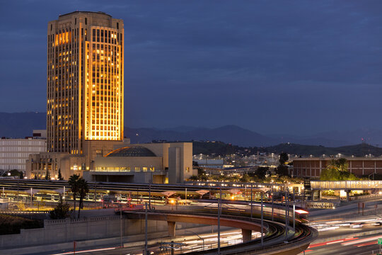 Los Angeles, California, USA - January 25, 2026: Long exposure of a light rail metro train passing above the 101 Freeway on its way to Union Station.
