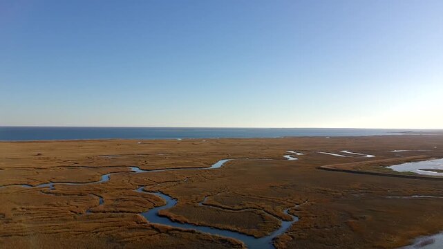Drone clip of slow ascension over the intercostal waterway in South Carolina just before sunset.