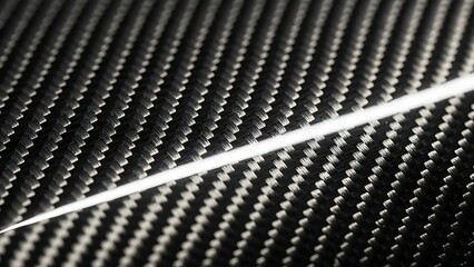 High-resolution detail of robust carbon fiber fabric showcasing its intricate diagonal weave