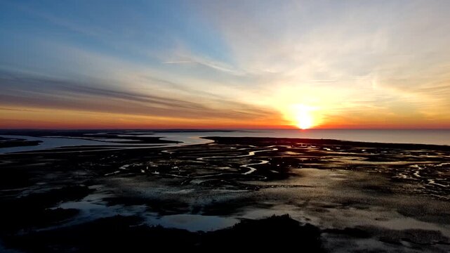 Drone clip of slow ascension over the intercostal waterway in South Carolina just before sunrise.