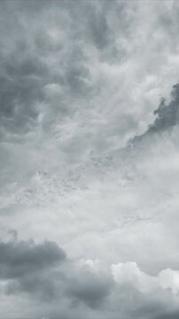 Foreboding atmospheric imagery, Scene features ominous weather with dramatic cloud formations, Menacing sky filled with layered clouds and shifting wispy atmospheric details