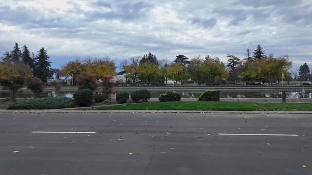 A walking viewpoint showcases the pond at the main entrance of California State Stanislaus University.