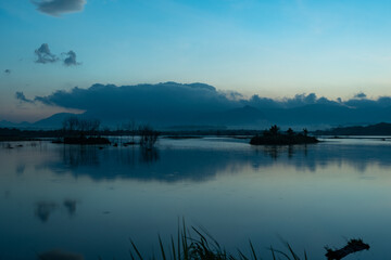 A nature view of sunset or sunrise over lake at Phang Nga Thailand