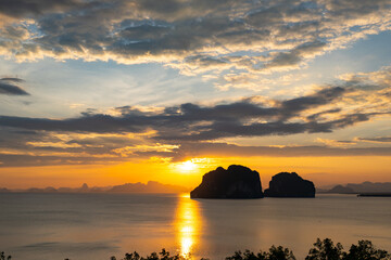 Landscape view of majestic clouds in the sky sunset or sunrise over sea