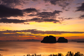 Landscape view of majestic clouds in the sky sunset or sunrise over sea