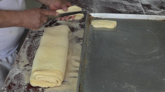 CUTTING FILLET TO MAKE THE SWEET BREAD CALLED EARS