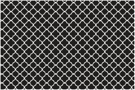 This image displays a high-contrast black and white repeating pattern. The design consists of interlocking white quatrefoil shapes, forming a continuous geometric lattice against a solid black 