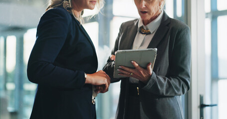 Business women, hands or discussion with tablet for company report, proposal or idea in office....