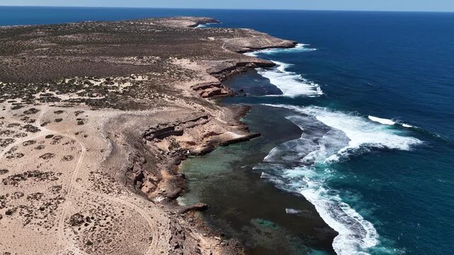 Scott Bay, Fowlers Bay, South Australia &ndash; 4K aerial drone view of Great Australian Bight coastline, turquoise ocean, sand dunes, white sand beach and limestone cliffs