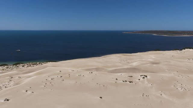 Scott Bay, Fowlers Bay, South Australia &ndash; 4K aerial drone view of Great Australian Bight coastline, turquoise ocean, sand dunes, white sand beach and limestone cliffs