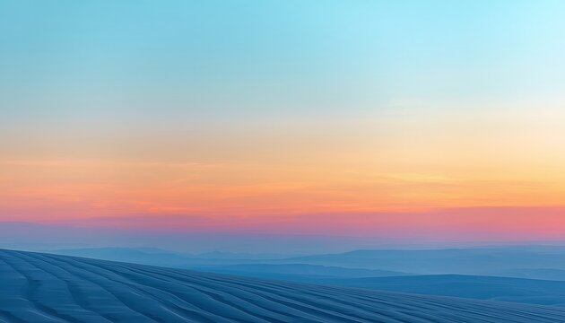 Serene Landscape with Gradient Sky at Sunset over Rolling Hills