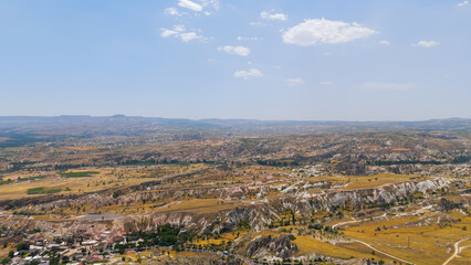Urgup, Nevsehir, Turkey. Wide panorama of surrounding landscape showing valleys and mountains in Cappadocia region.. Aerial View