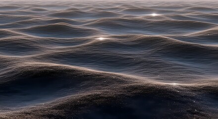 ocean waves at sunset, shimmering water surface