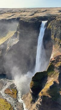 Haifoss and Granni are two waterfalls in Foss&aacute; river that cascade into the Fossardalur in Iceland