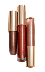 Three tubes of shimmery lip gloss in warm brown tones.  Glossy, metallic,  golden caps.  Close-up