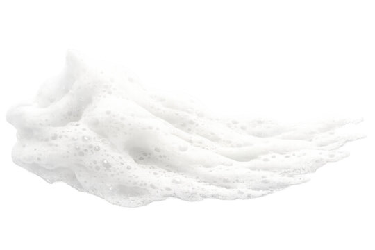 White airy foam, like shaving cream or soap suds, creating a fluffy texture with bubbles, isolated on transparency