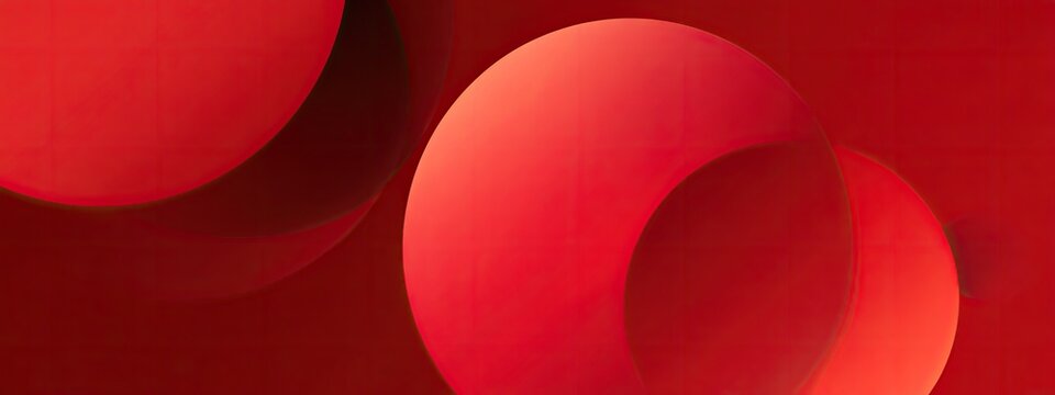 Abstract graphic design with overlapping red spheres and subtle shadows on a gradient red background