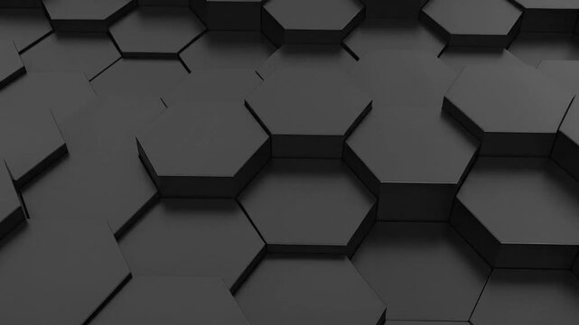 A dark gray, three-dimensional surface comprised of hexagonal tiles, forming a textured pattern