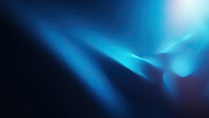 A dark background with flowing, ethereal blue lights creating a sense of energy and movement