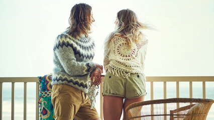 Obraz premium Back, couple and thinking on balcony outdoor with love, calm morning and reflection on holiday. Thoughts, people and terrace for fresh air, daydreaming and bonding together in nature at vacation home