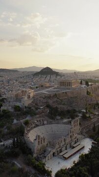 Acropolis Parthenon Odeon of Herodes Atticus amphitheatre Athens Greece aerial drone vertical video