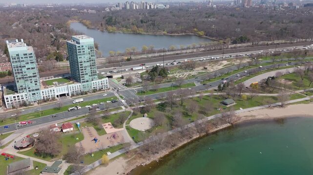 Fast Motion Aerial Shot Of Cars Commuting On Highways Near Lake Ontario And High Park In Toronto, Canada.