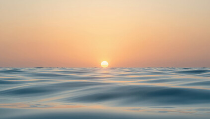 Obraz premium Serene sunset over calm sea with golden horizon and soft pastel sky