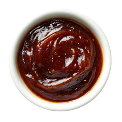 Glossy dark brown sauce fills a small white bowl, viewed from directly above