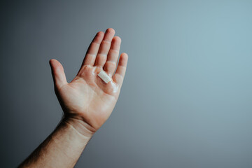 Male hand with blister covered by bandage