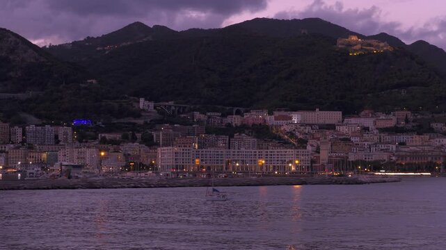 Salerno City With Arechi Castle At Night In Campania, Italy. - aerial shot