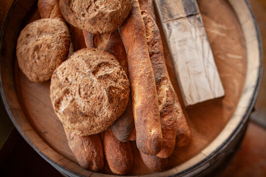 Overhead view looking down on different types of fresh breads