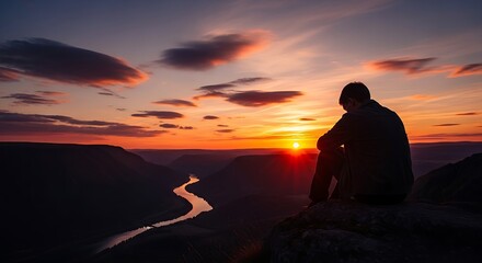 a man with closed eyes smiling in warm sunlight with blurry green background