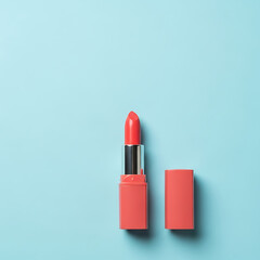 Coral Mockup Lipstick Open With Cap Beside Isolated On Light Blue Background Top View