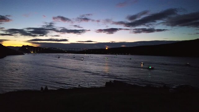 Sunset with boats under the Krk Bridge