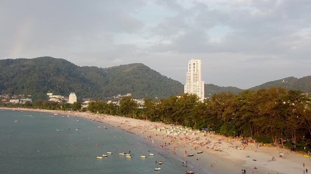 Aerial view of Patong Beach at sunset in Phuket, Thailand. Going Down from the sky