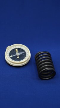 Wrong Compass. Metal Object Cause of the Compass Failure. Needle Swings Uncontrollably. Minimalism. Shallow Depth of Field.