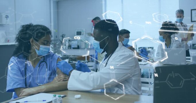 Animation of chemical formula over diverse doctor and patient